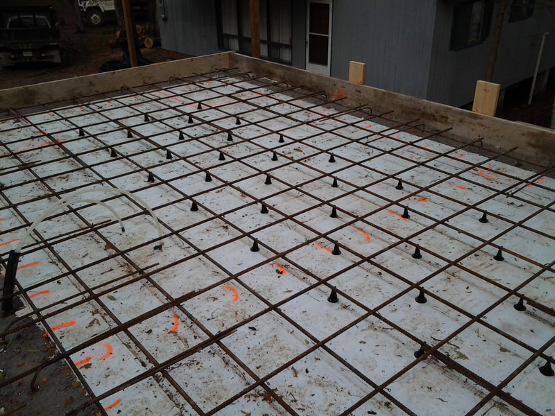 Floating slab with insulation under construction.