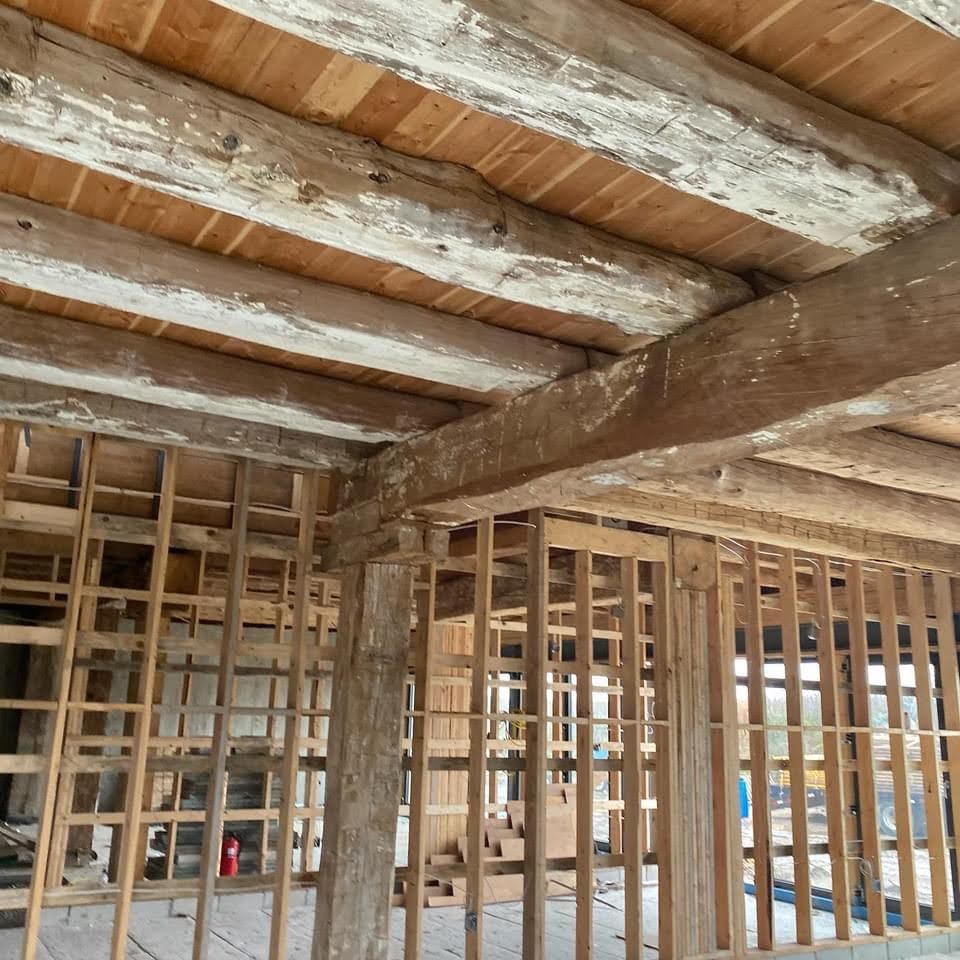 Interior of a timber barn restoration.
